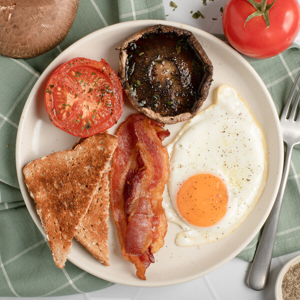 British-Style Breakfast with Bacon, Fried Egg, Portobello & Tomato