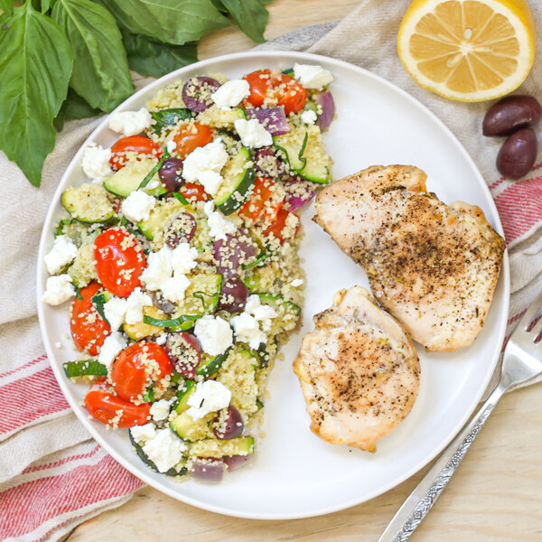 Roast Chicken Thighs with Tomato-Zucchini Couscous & Goat Cheese