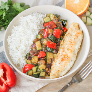 Tilapia with Cilantro-Orange Zucchini & Bell Pepper Sauté over Rice