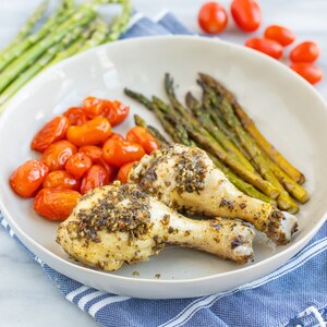 Baked Pesto Drumsticks with Balsamic-Roasted Asparagus & Tomatoes