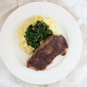 Striploin Steak with Mashed Potatoes & Garlicky Spinach Sauté