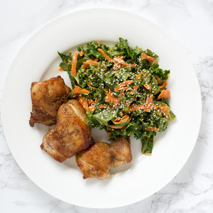 Pan-Fried Chicken Thighs with Thai-Inspired Kale, Carrot & Peanut Salad