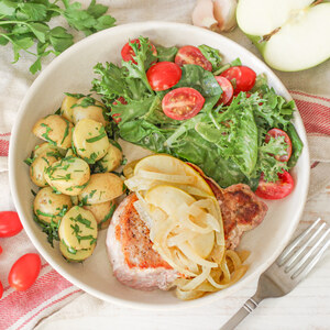 Pork Chop with Honey-Dijon Apples, Parsley Potatoes & Mixed Greens